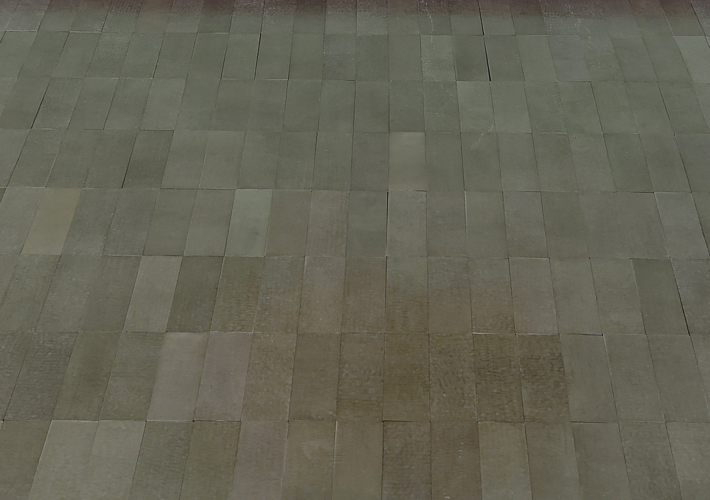 Raymond Hammered Metal Floor Tiles