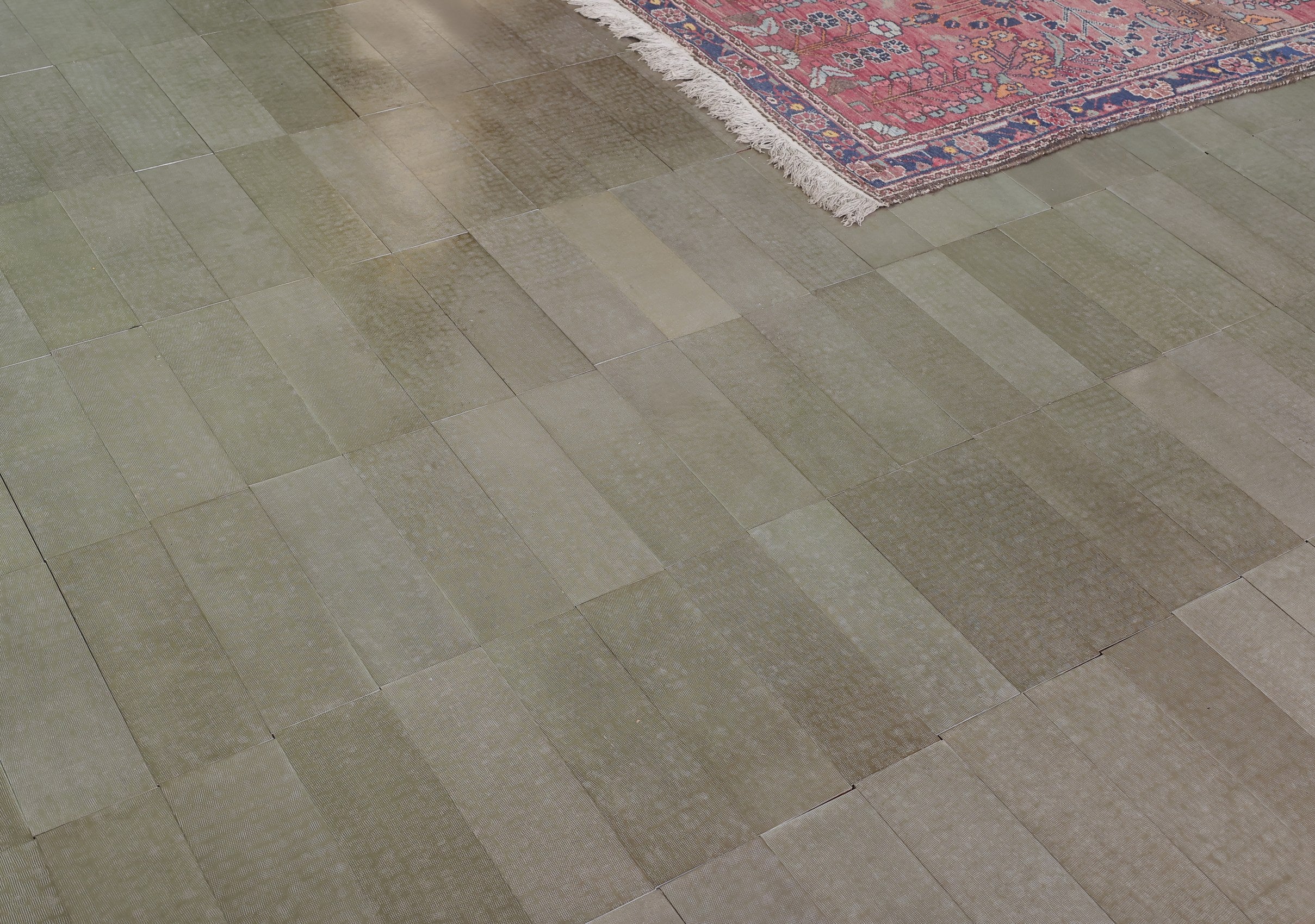 Raymond Hammered Metal Floor Tiles